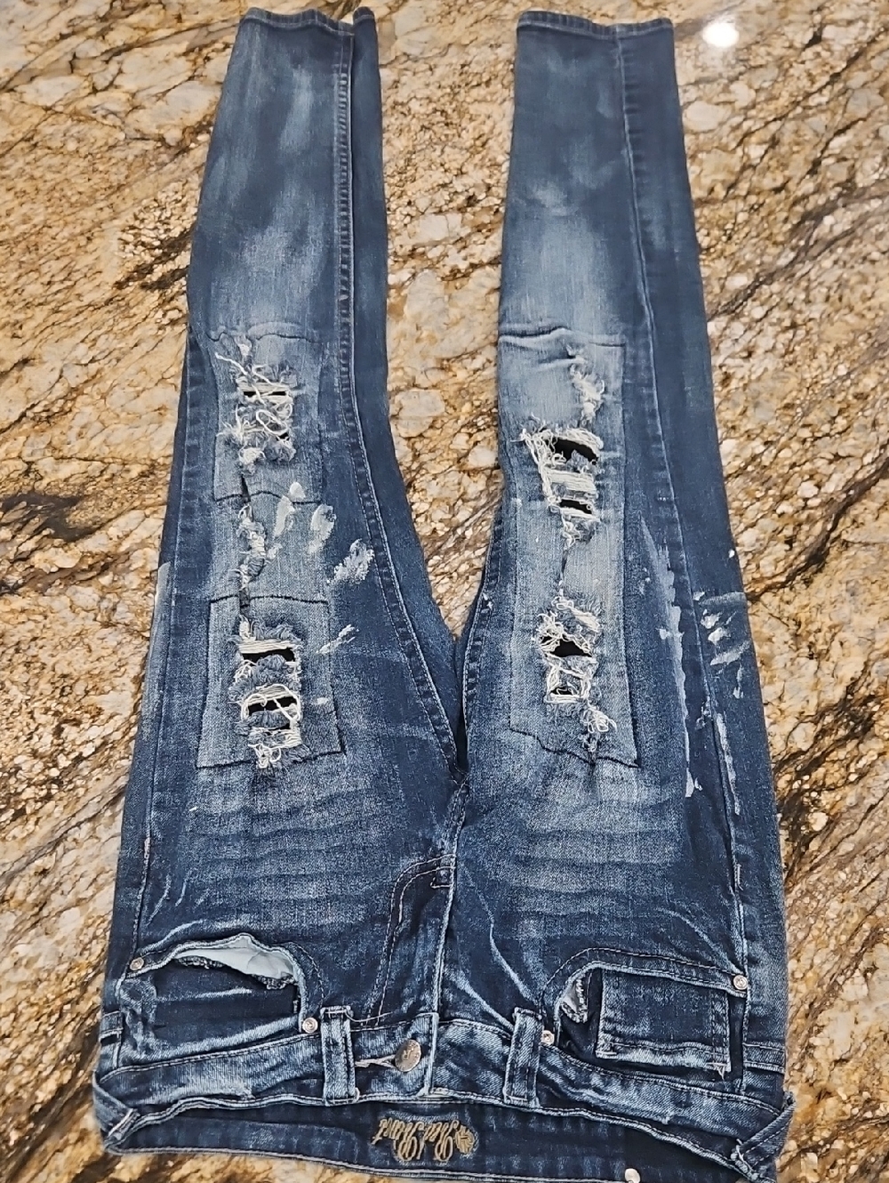 Red Rivet Blue Denim Distressed With Paint. Size 5. Inseam 30.5" Rise 7.5"